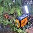 Radio portabil PNI DYN300, cu dinam, incarcare solara, lanterna, acumulator 4000 mAh, SOS, IPX3, orange